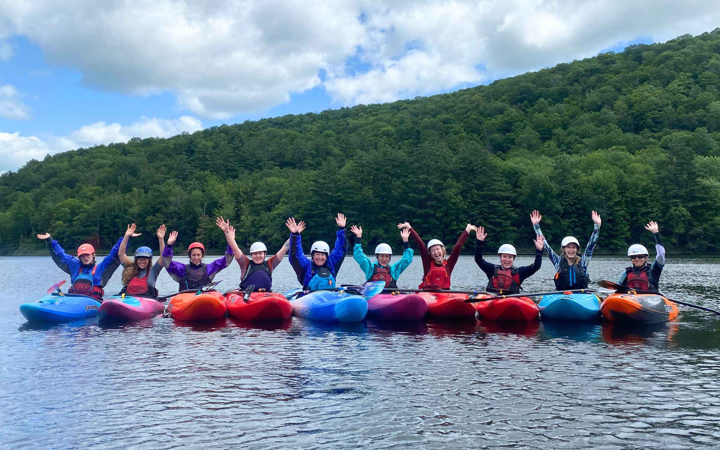 Zoar staff in kayaks on the deerfield river