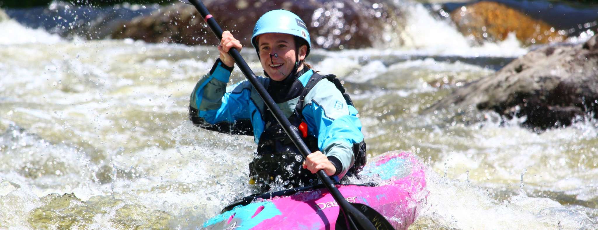 Single kayaker in whitewater of deerfield river