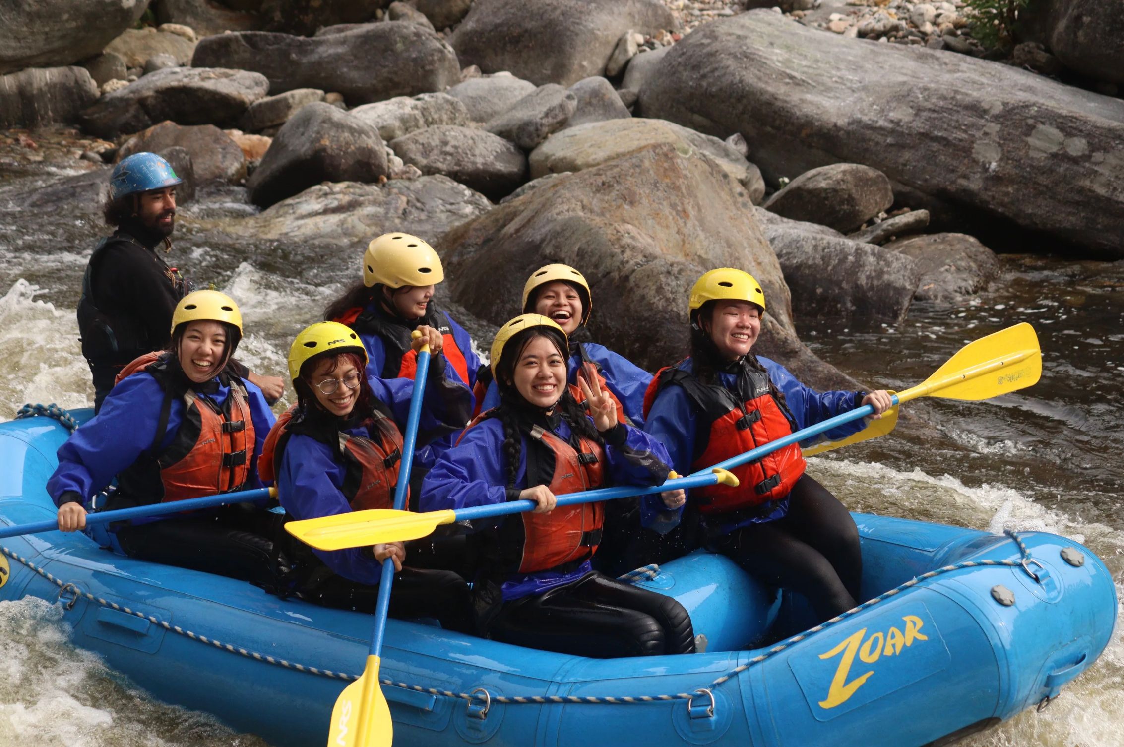 Girlfriend group on whitewater rafting adventure 