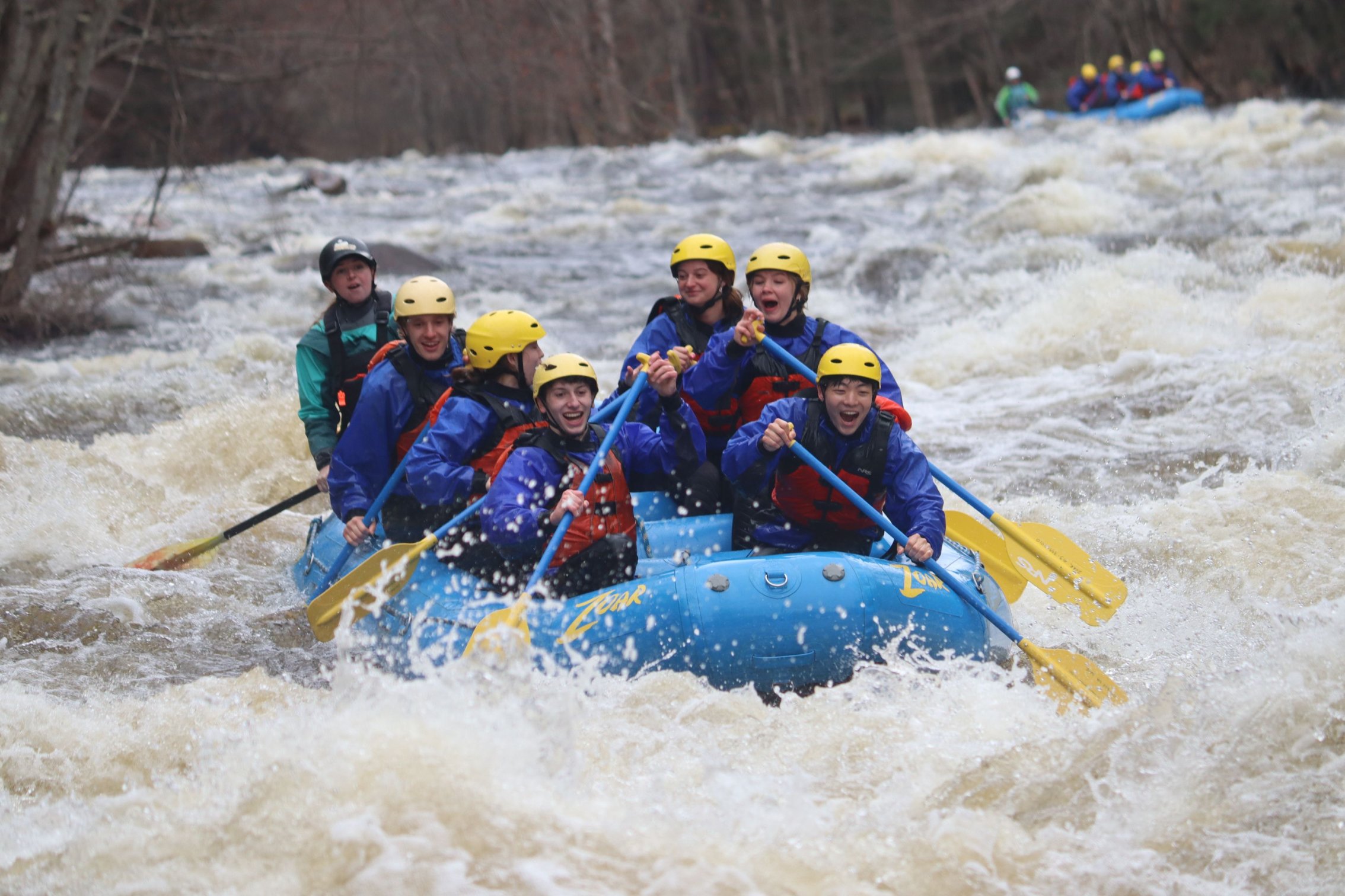 Group of paddlers on whitewater adventure down Deerfield river
