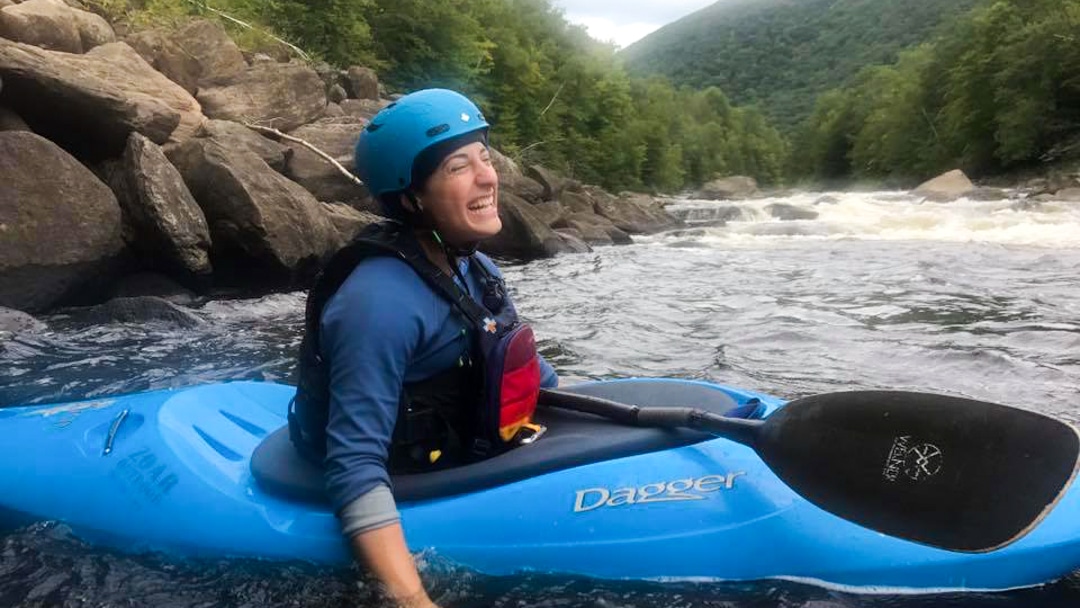 Amanda Major in a kayak on a river