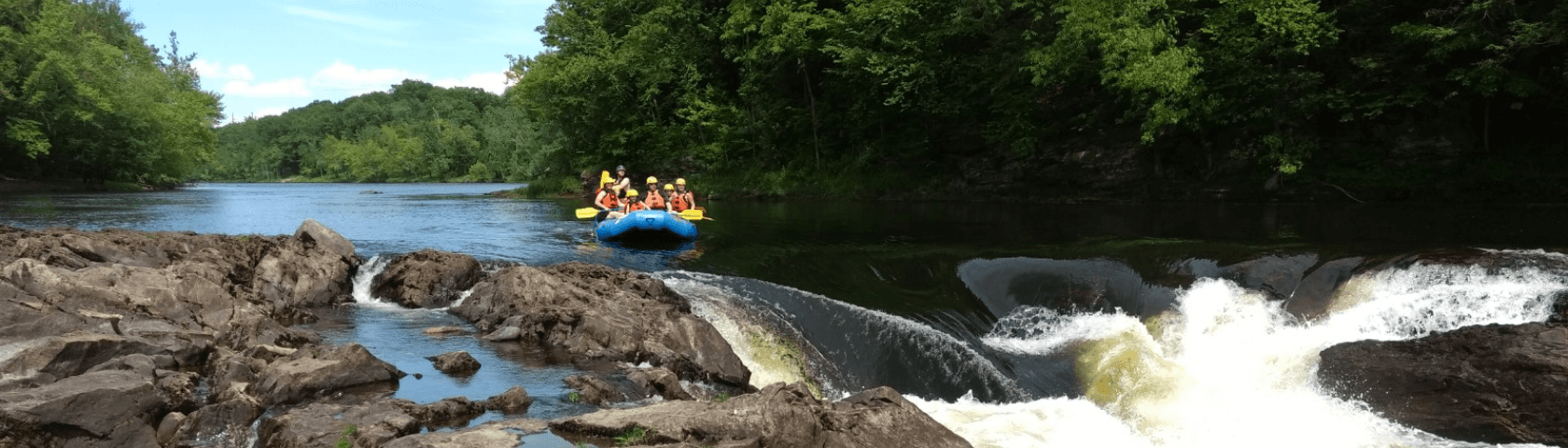 Raft group approaching a small rapid