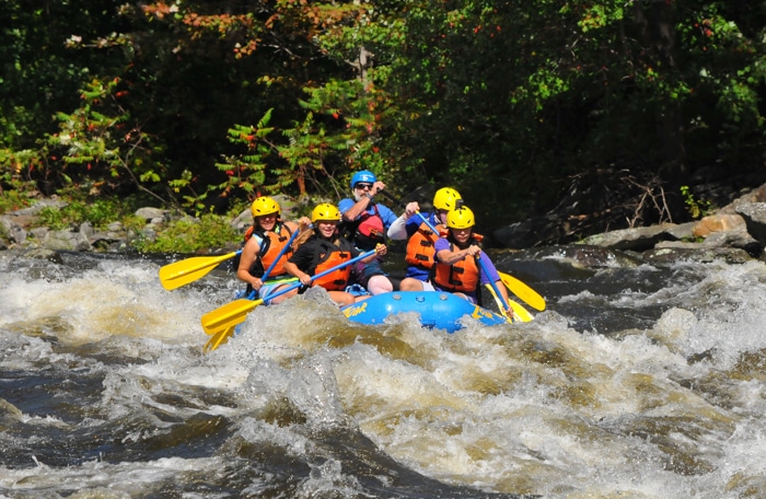 Group navigating the west river rapids