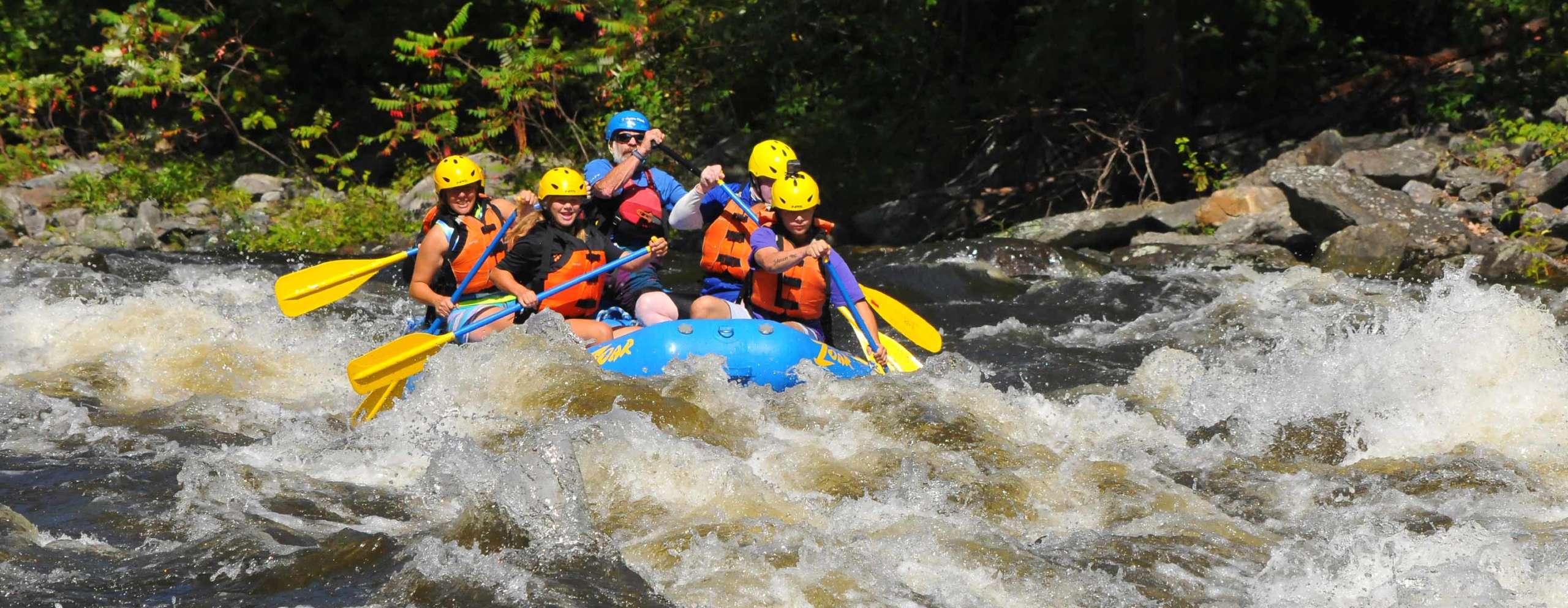Group navigating the west river rapids