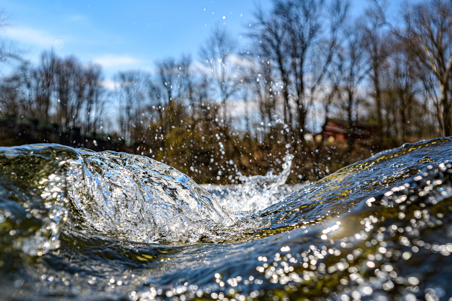 Close-up shot of small waves breaking on a river