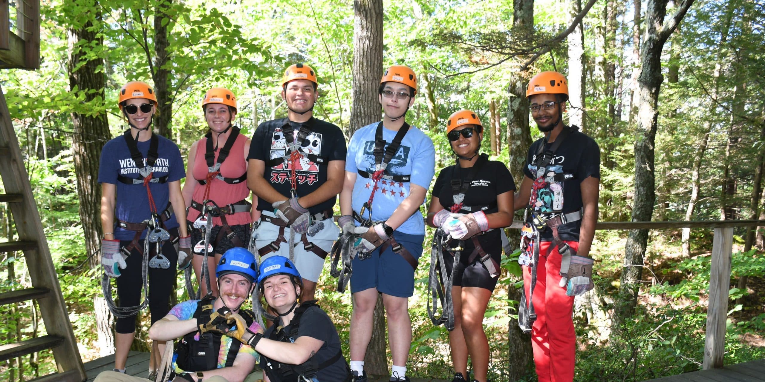 group of college students excited to zipline